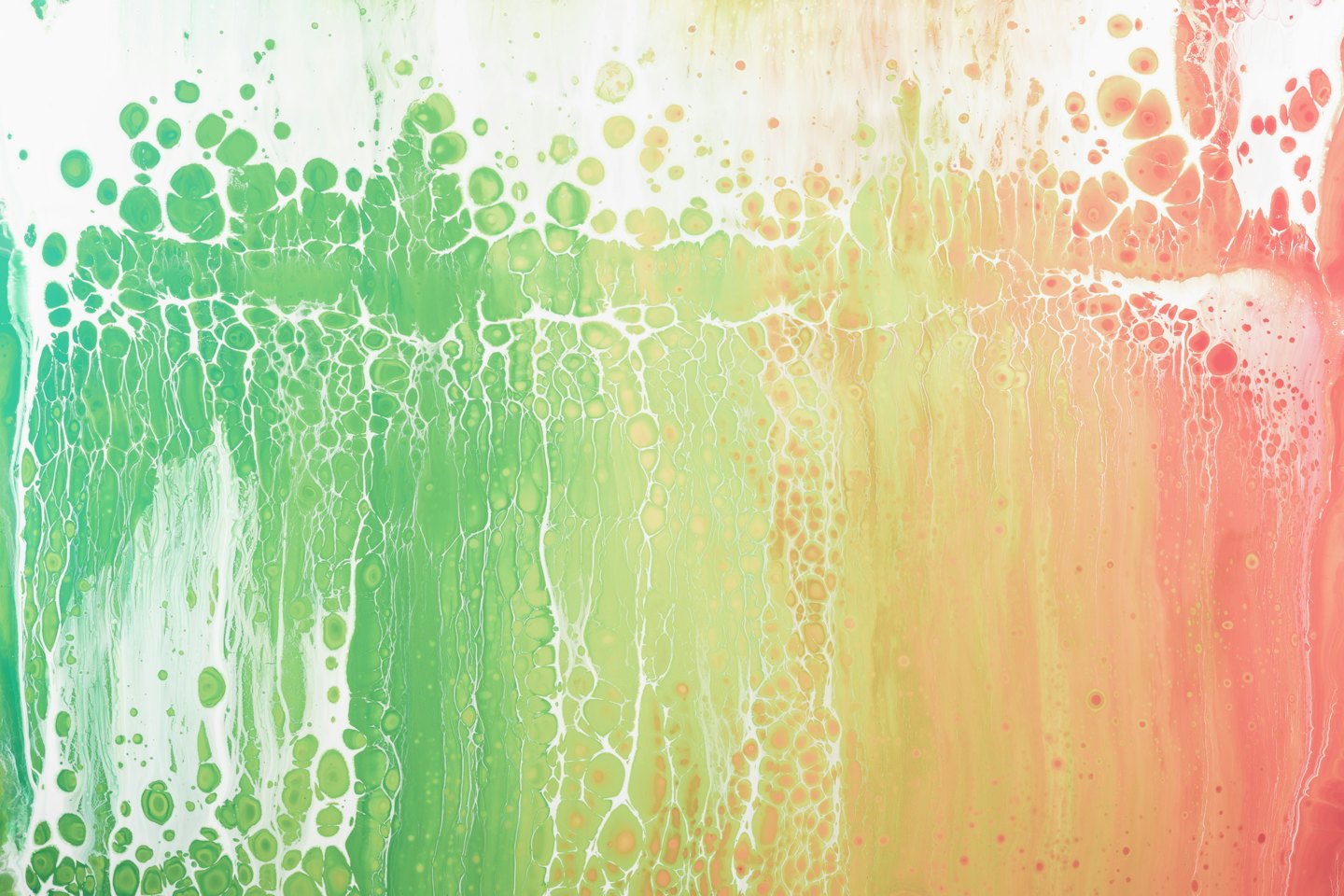 Abstract cellular fluid art with green, yellow, and orange flowing lines.